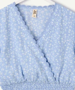 Blouse fille courte bleue fleurie