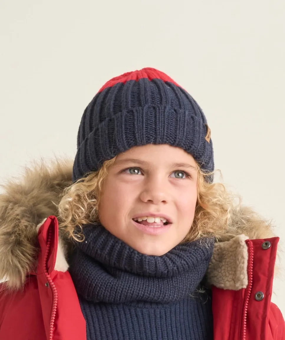 Bonnet bicolore en maille bleu et rouge garçon