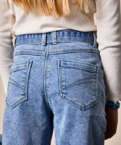 Jean fille mom denim bleu avec ceinture