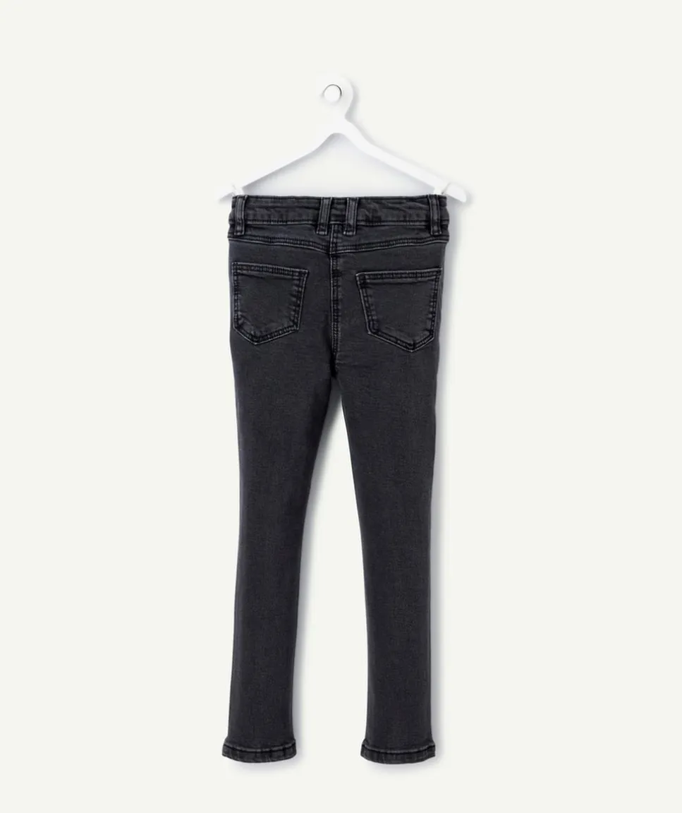 Jean skinny fille denim noir avec clous