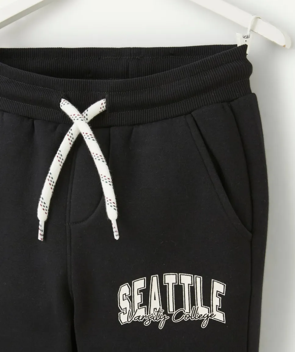 Jogging garçon en fibres recyclées noir thème campus