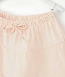 Jupe fille en coton rose pâle avec broderies et volants
