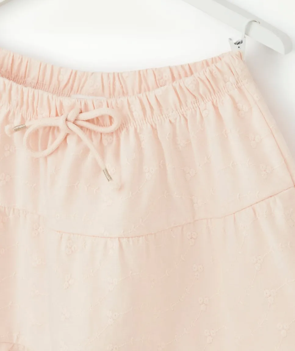 Jupe fille en coton rose pâle avec broderies et volants