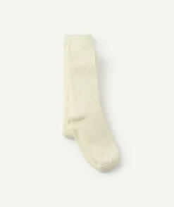Paire de collants en maille écrus avec pois couleur dorée fille
