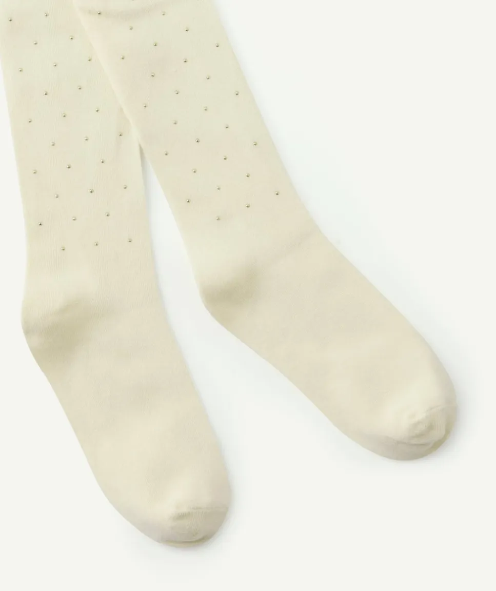Paire de collants en maille écrus avec pois couleur dorée fille