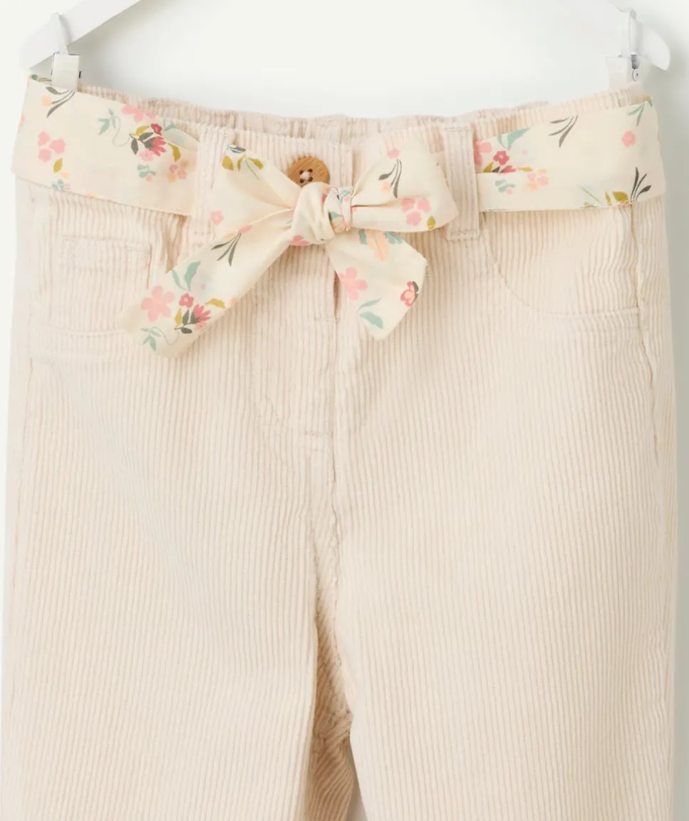 Pantalon bébé fille rose clair avec ceinture fleurie