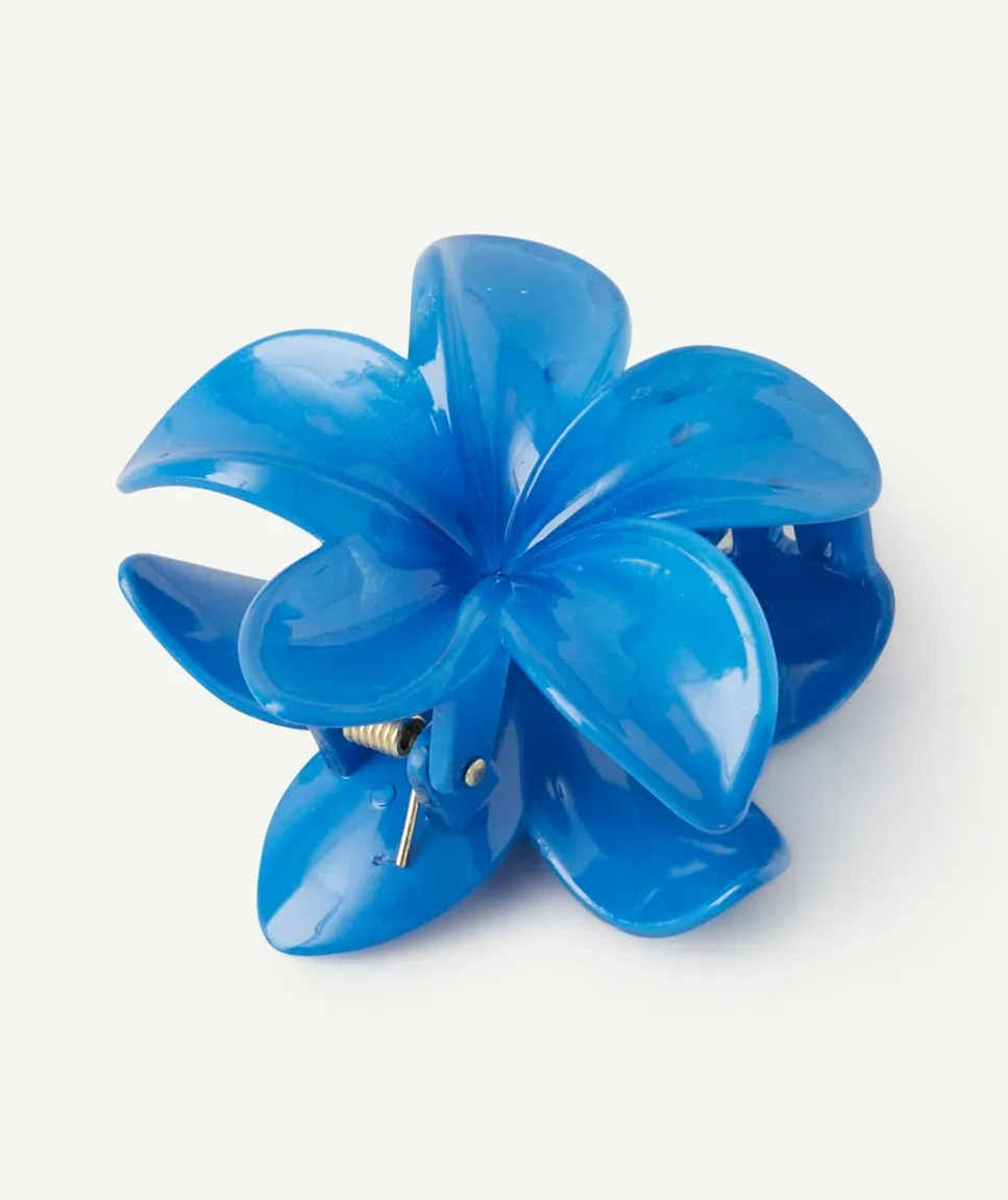 Pince fille fleur bleue