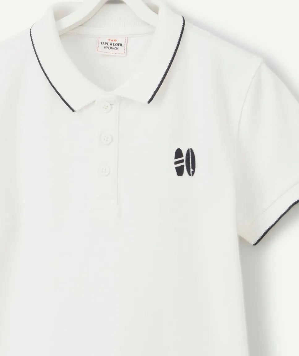 Polo garçon en coton blanc avec surf brodé