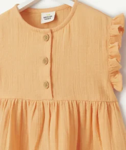 Robe bébé fille en gaze de coton orange avec volants