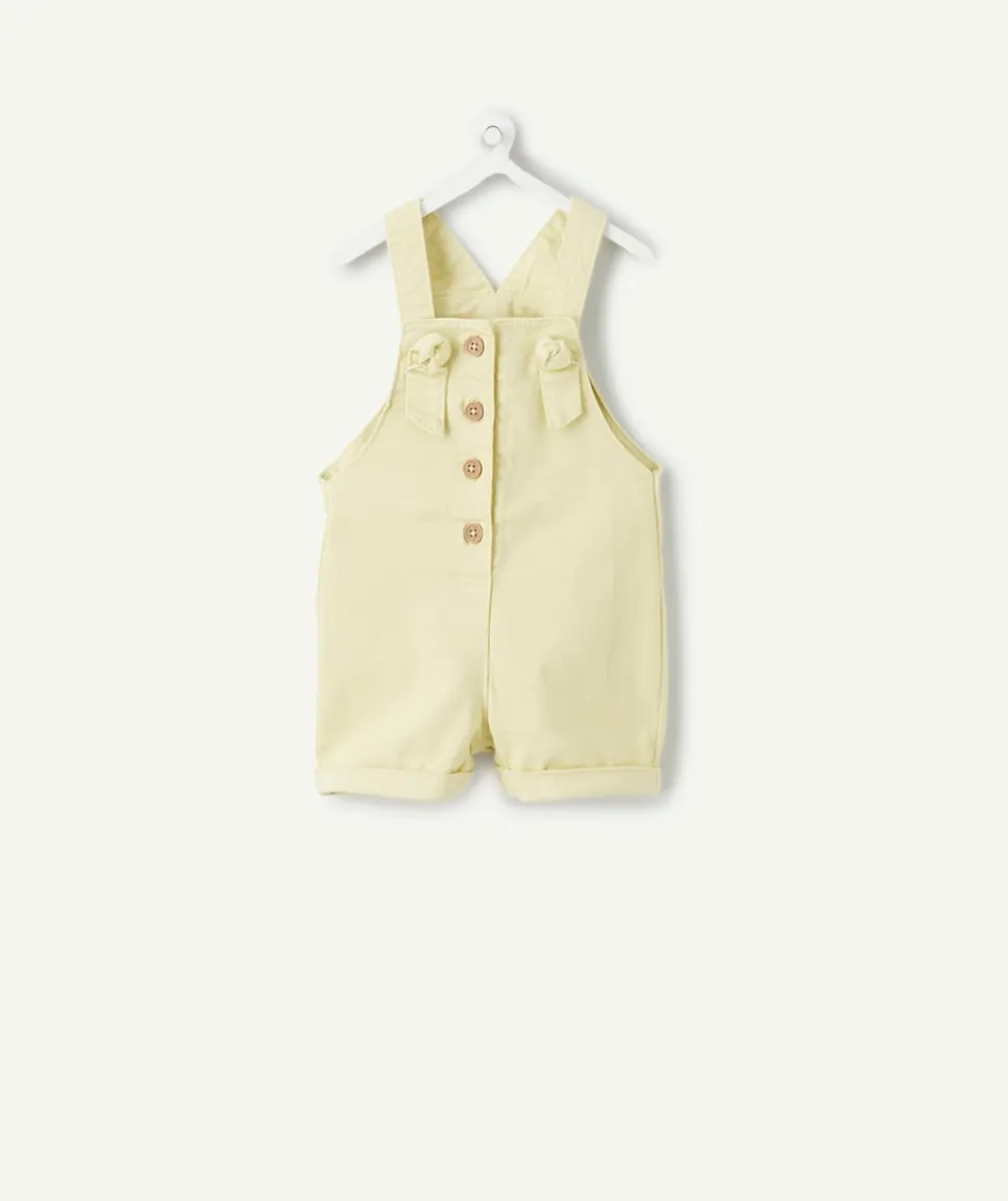 Salopette bébé fille en coton jaune boutons