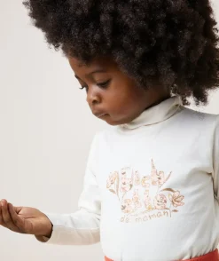 Sous-pull bébé fille col roulé en coton bio écru et message pailleté