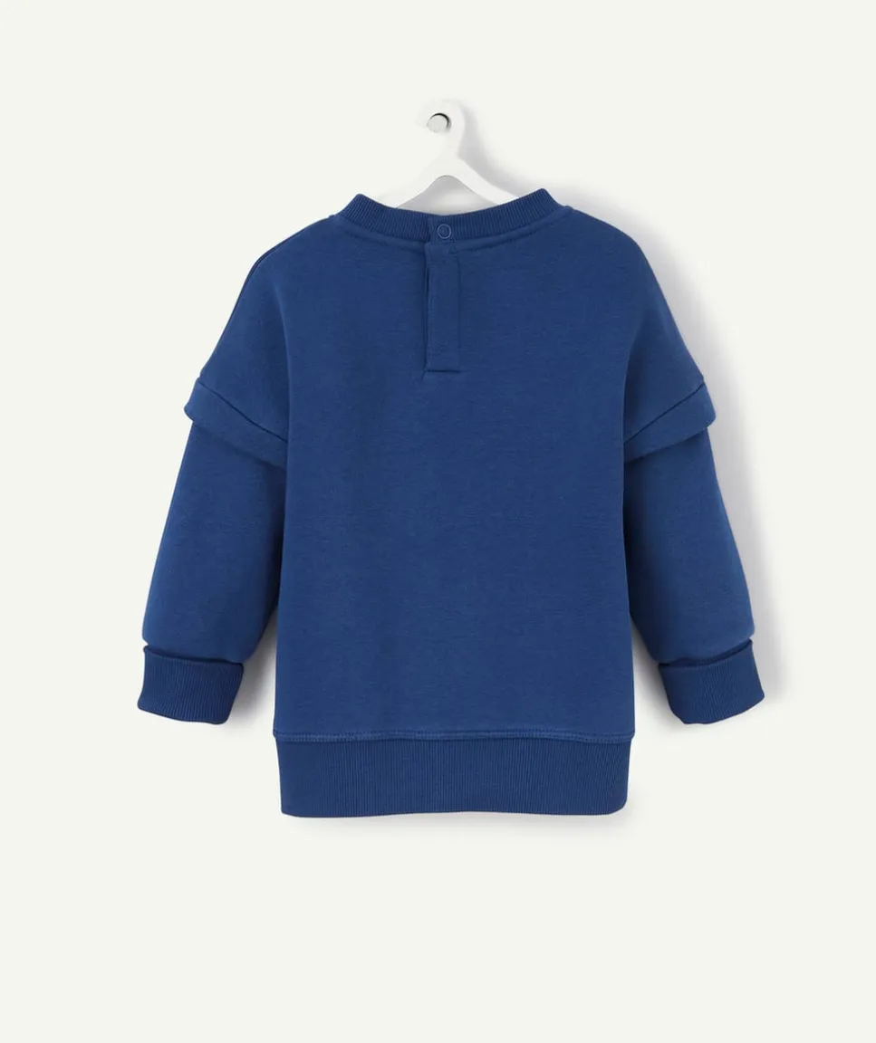 Sweat évolutif bleu marine en fibres recyclées avec floquage plage