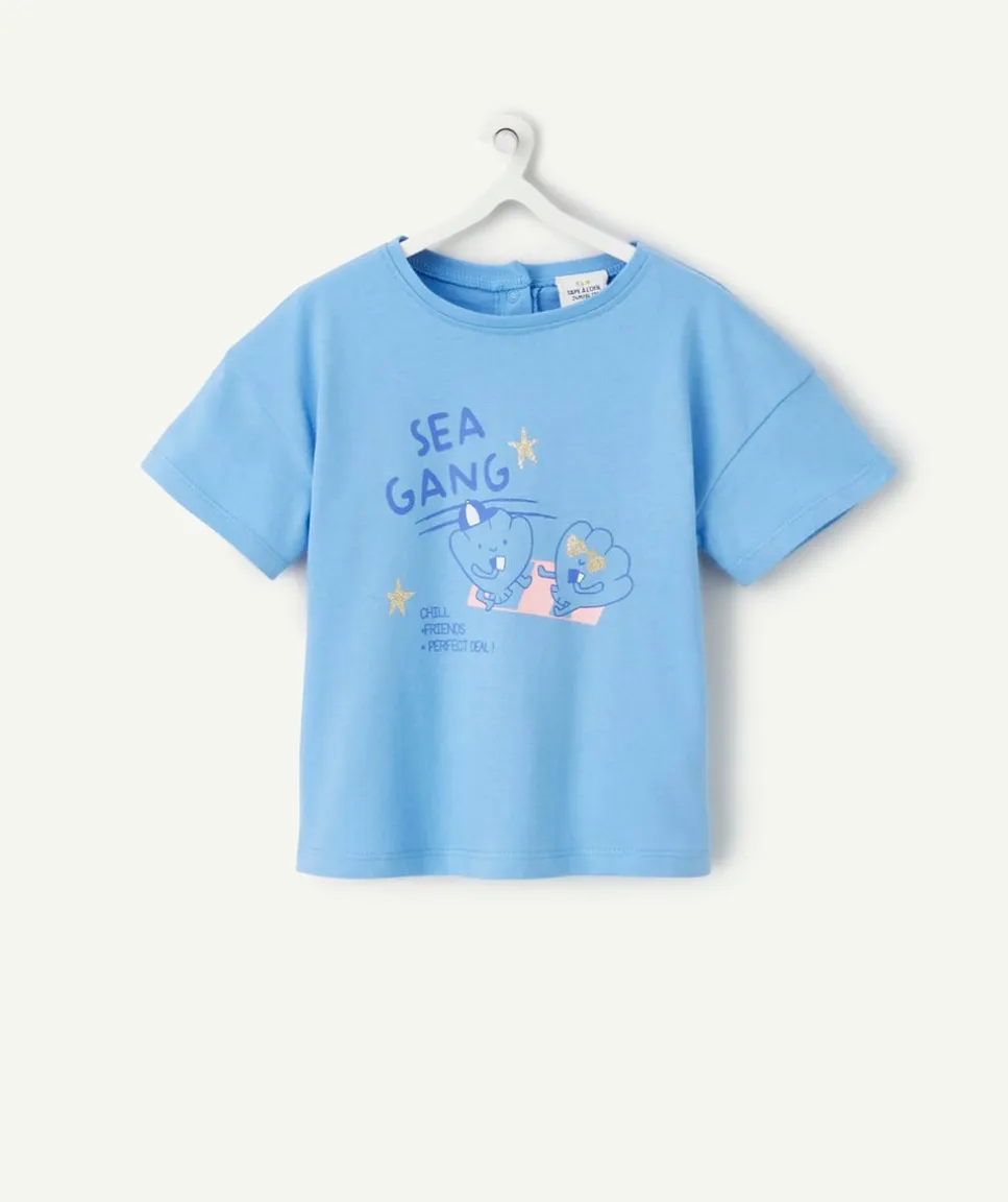 T-shirt bébé fille en coton bio bleu avec motifs coquillages et étoiles pailletées