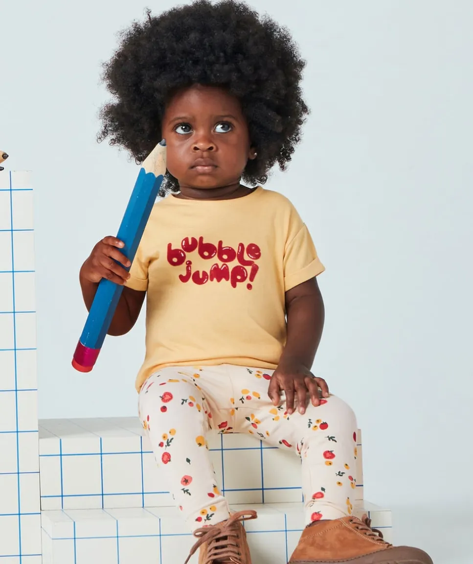 T-shirt bébé fille en coton bio jaune avec message en feutrine