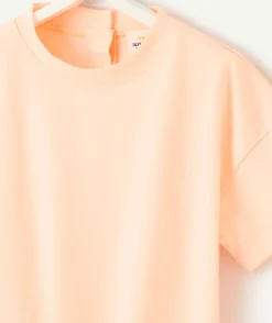 T-shirt manches courtes bébé fille orange fluo avec petit nœud