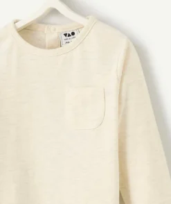 T-shirt manches longues bébé garçon en coton bio écru avec poche sur le cœur