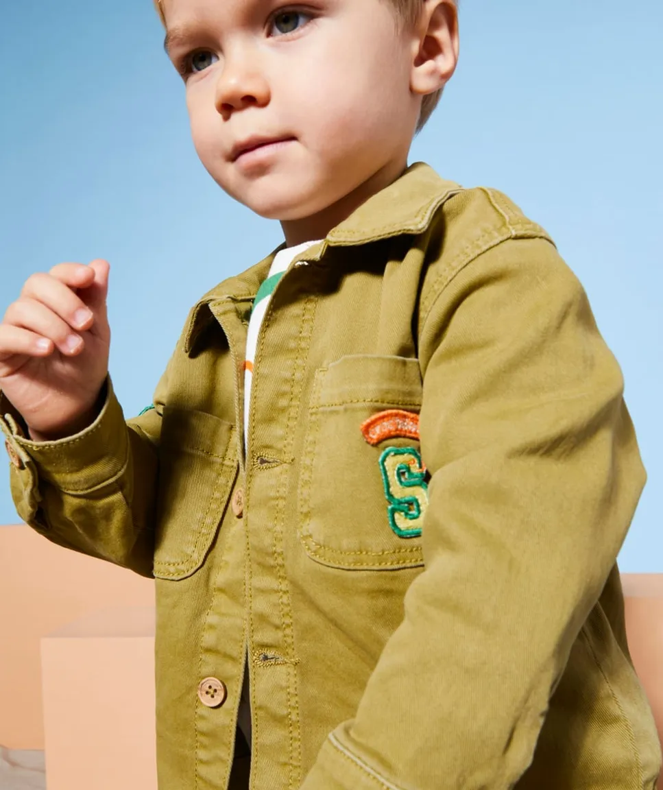 Veste bébé garçon en fibres recyclées verte avec poches et patchs
