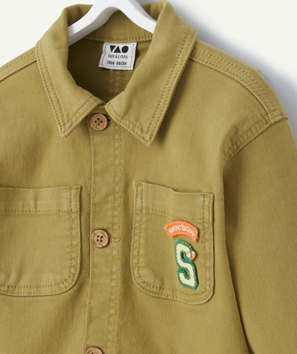 Veste bébé garçon en fibres recyclées verte avec poches et patchs